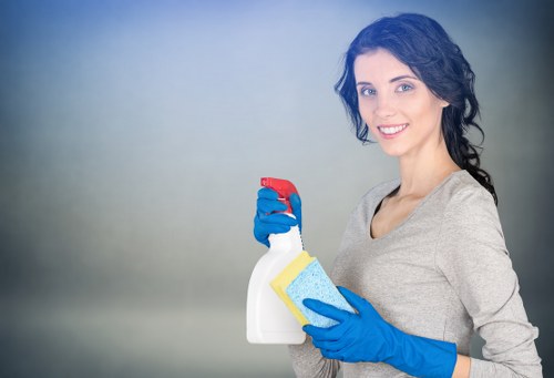 Safety-focused cleaning team handling equipment and products carefully